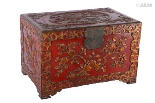 A GILT-DECORATED CINNABAR LACQUER WEDDING CHEST.