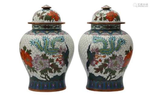 A PAIR OF CHINESE CLOISONNÉ ENAMEL JARS AND COVERS.