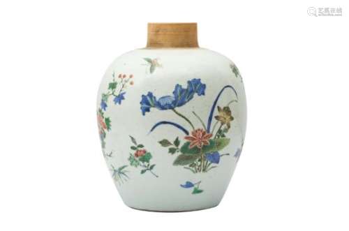 A CHINESE WUCAI 'BLOSSOMS' JAR.