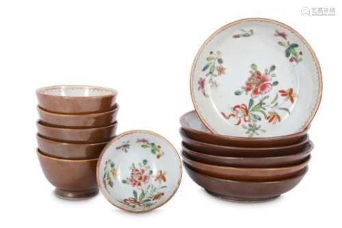 SIX CHINESE FAMILLE ROSE CAFE AU LAIT-GROUND CUPS AND SAUCERS.