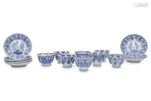 EIGHT CHINESE BLUE AND WHITE 'POMEGRANATE' CUPS AND SEVEN SAUCERS.
