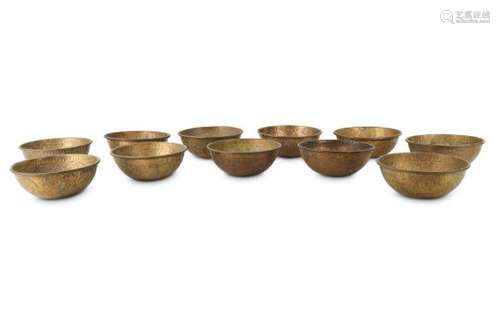 ELEVEN METAL BOWLS.