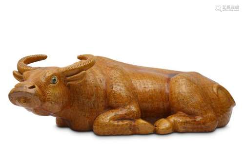 A LARGE CHINESE BISCUIT YELLOW-GLAZED MODEL OF A BUFFALO.