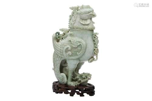 A CHINESE APPLE-GREEN JADEITE 'DRAGON AND PHOENIX' VESSEL AND COVER.