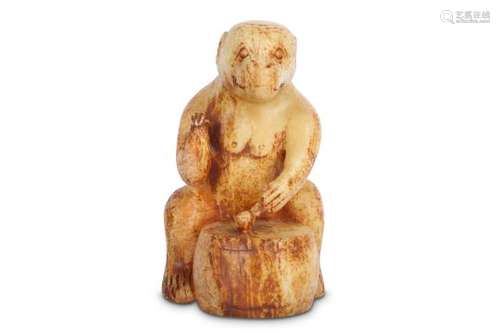 A CHINESE HARDSTONE CARVING OF A MONKEY.