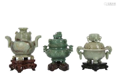 THREE CHINESE GREEN HARDSTONE INCENSE BURNERS AND COVERS.