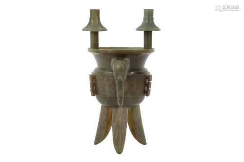 A CHINESE CARVED JADE RITUAL WINE VESSEL, JUE.