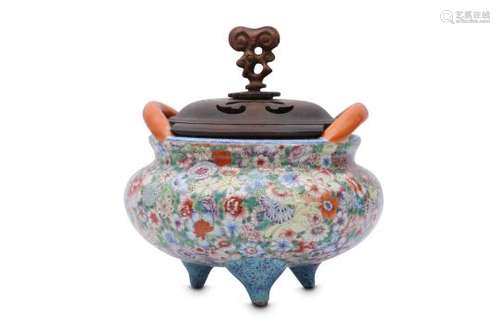 A CHINESE MILLEFULER GROUND TRIPOD INCENSE BURNER.