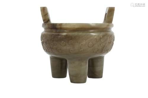 A CHINESE CARVED JADE TRIPOD INCENSE BURNER.