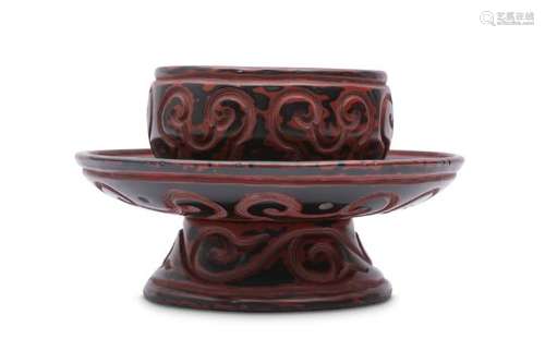 A TIXI LACQUER CUP STAND.