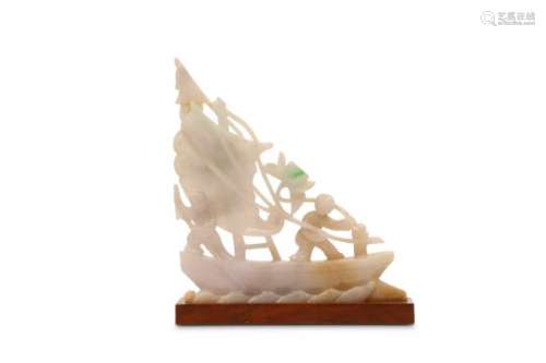 A CHINESE JADEITE ‘RAFT’ CARVING.