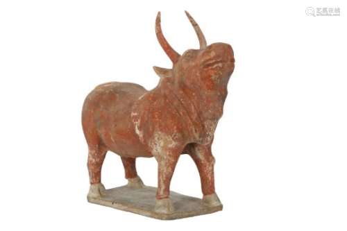 A CHINESE POTTERY MODEL OF A BULL.