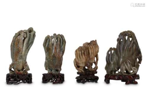 FOUR CHINESE JADE 'FINGER CITRON' CARVINGS.