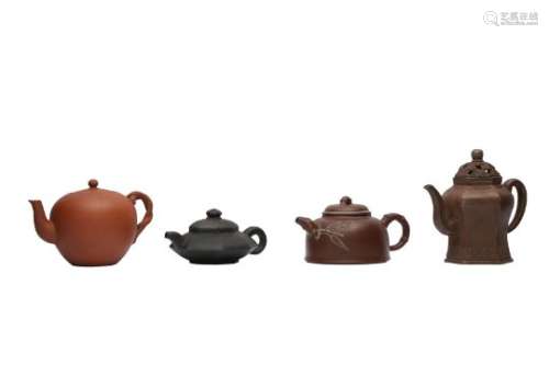 FOUR CHINESE YIXING TEAPOTS AND COVERS.