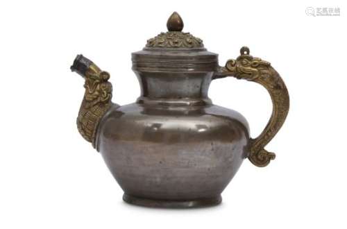 A TIBETAN PEWTER AND COPPER MILK TEAPOT AND COVER.
