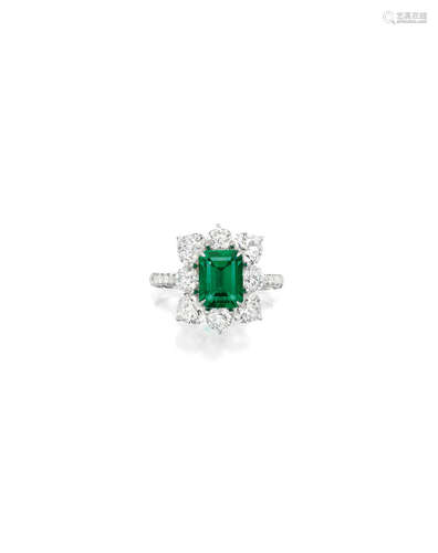 AN EMERALD AND DIAMOND RING