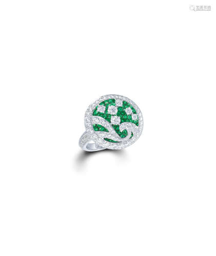 AN EMERALD AND DIAMOND 'WAVE' RING, GRAFF