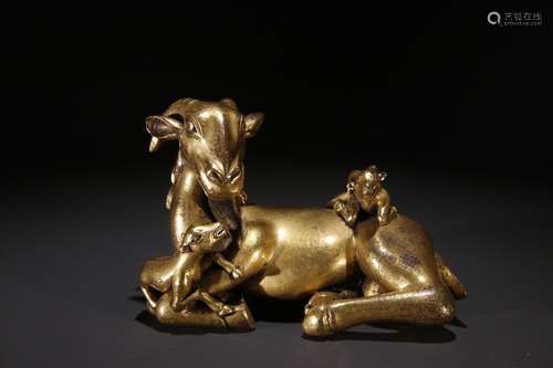 A Chinese Gilt Bronze Beast Paperweight