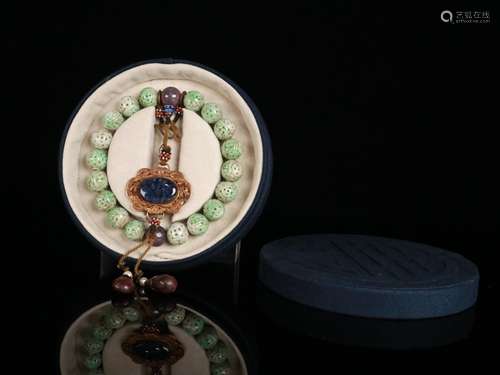 A Chinese Jadeite Pattern 18-Bead Pendant