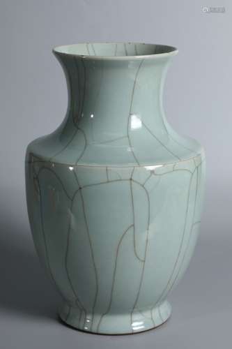 A Chinese Porcelain Pea Green Glazed Zun