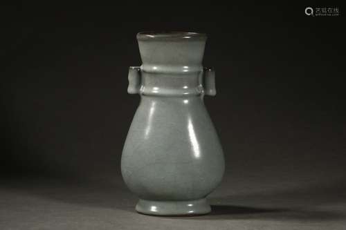 A Chinese Porcelain Guan Glaze Pierced-Ear Vase