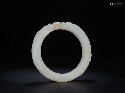 A Chinese Hetian Jade Dragon Carved Bangle