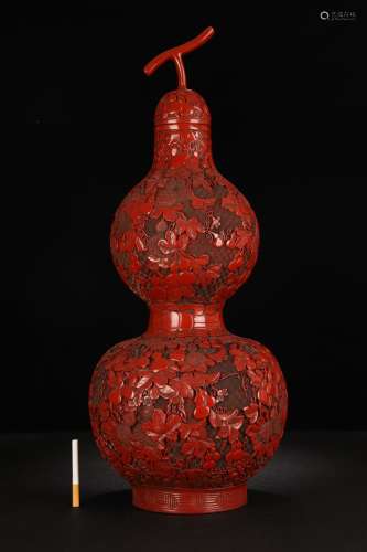 A Chinese Red Lacquerware Auspicious Pattern Gourd Ornament
