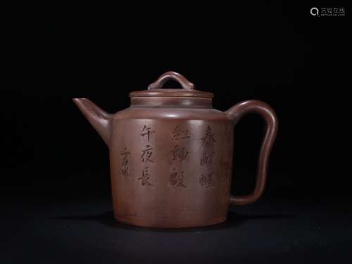 A Chinese Zisha Teapot With Potery Carving