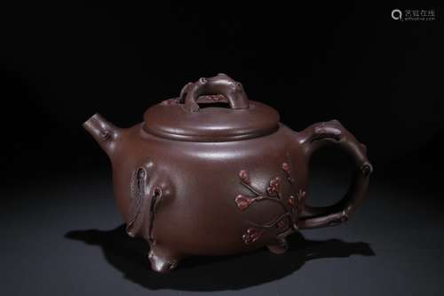 A Chinese Zisha Teapot With Plum Flower Pattern