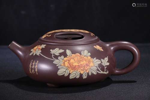 A Chinese Zisha Teapot With Auspicious Pattern