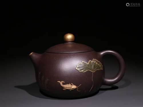 A Chinese Zisha Teapot With Auspicious Pattern