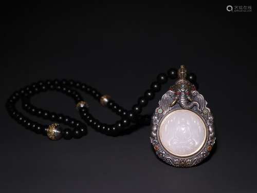 A Chinese Silver Necklace With White Jade