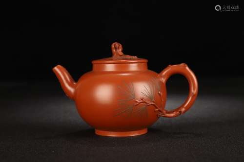 A Chinese Zisha Teapot With Tree Pattern