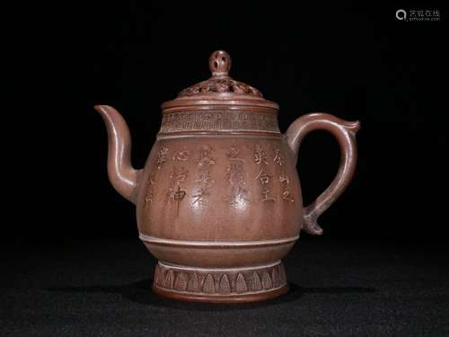 A Chinese Zisha Teapot With Potery Carving