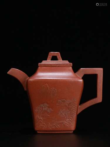 A Chinese Zisha Teapot With Potery Carving