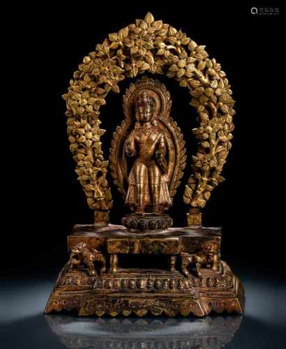 Partiell feuervergoldete Bronze des Dipankara-Buddha auf einem Thron mit Blüten