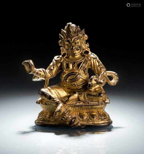 Vergoldete Bronze des Vaishravana mit seinem Mungo in der linken Hand auf einem Lotos