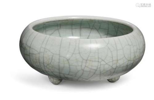 A large Chinese tripod washer of compressed globular form adorned with celadon [...]