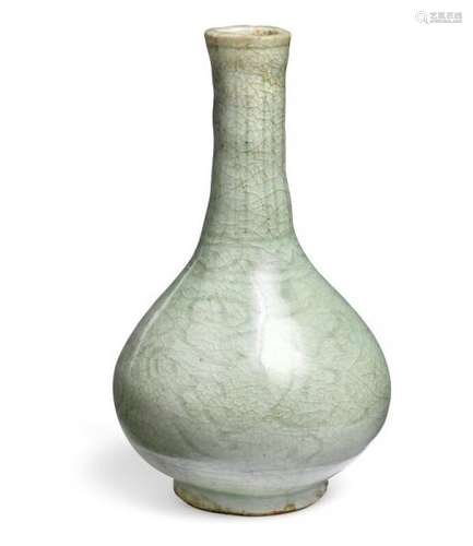 A Chinese stoneware bottle vase with celadon slip-coating depicting fish and design. [...]