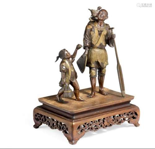 A Japanese bronze figure-group of a fisherman and beside him a child with basket. [...]