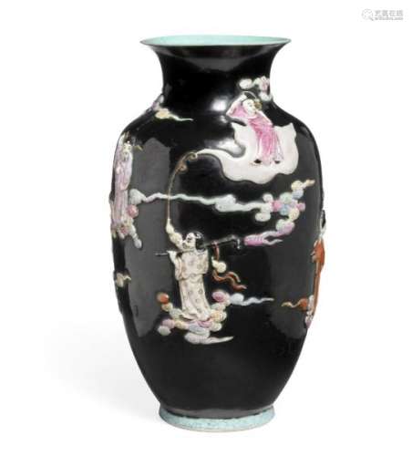 A Chinese moulded famille noire baluster porcelain vase, Qianlong mark. Late [...]