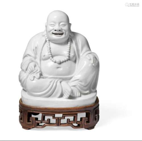 A Chinese Dehua ware laughing Budai. Kangxi. -