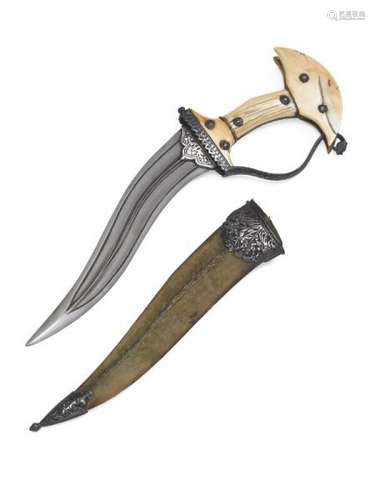 A good Indian Khanjarli dagger in its scabbard with a wootz blade. -