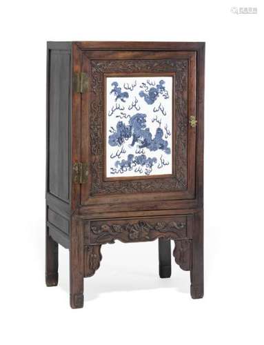 A Chinese hongmu cupboard on stand. Guangxu 1875–1908, late 19th century. H. 137 [...]