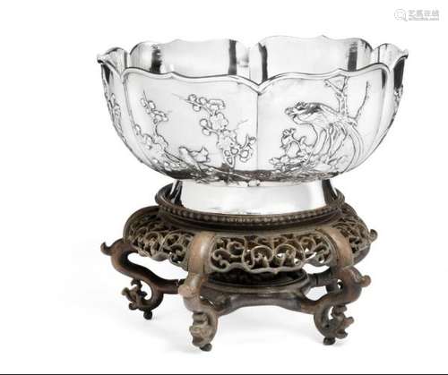 A Chinese silver bowl with applied decoration of flowers and birds Maker's mark [...]