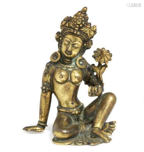 A Nepali gilt bronze figure of a female bodhisattva. 18th century. Weight 234 g. H. [...]