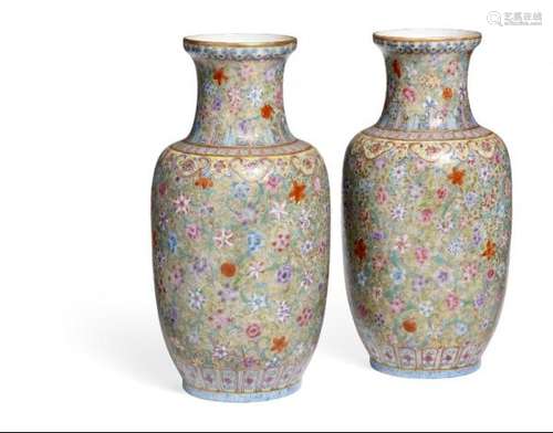 A pair of Chinese famille rose 'mille-fleurs' eggshell porcelain baluster vases. [...]