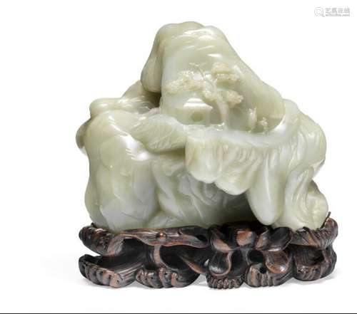 A celadon green jade mountain boulder. China 20th century. Weight 1928 g. H. 13 cm. [...]