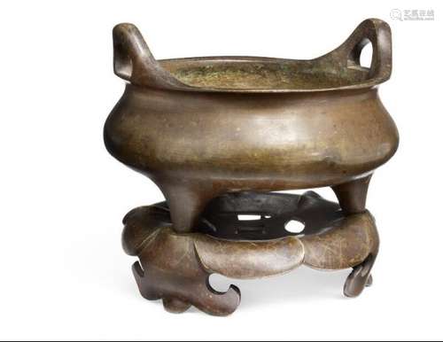 A Chinese bronze censer and its stand. 18th-19th century. Weight 2334 g. (2) -