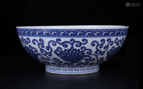 A BOWL WITH PATTERN OF BLUE AND WHITE LOTUS TWINING ROUND BRANCHES